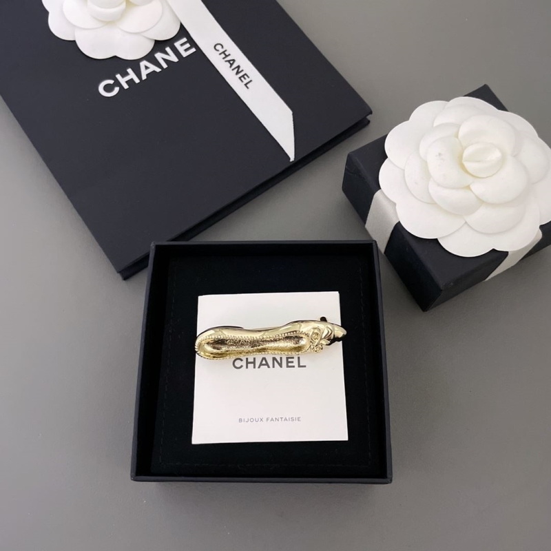 Ch*el brooches